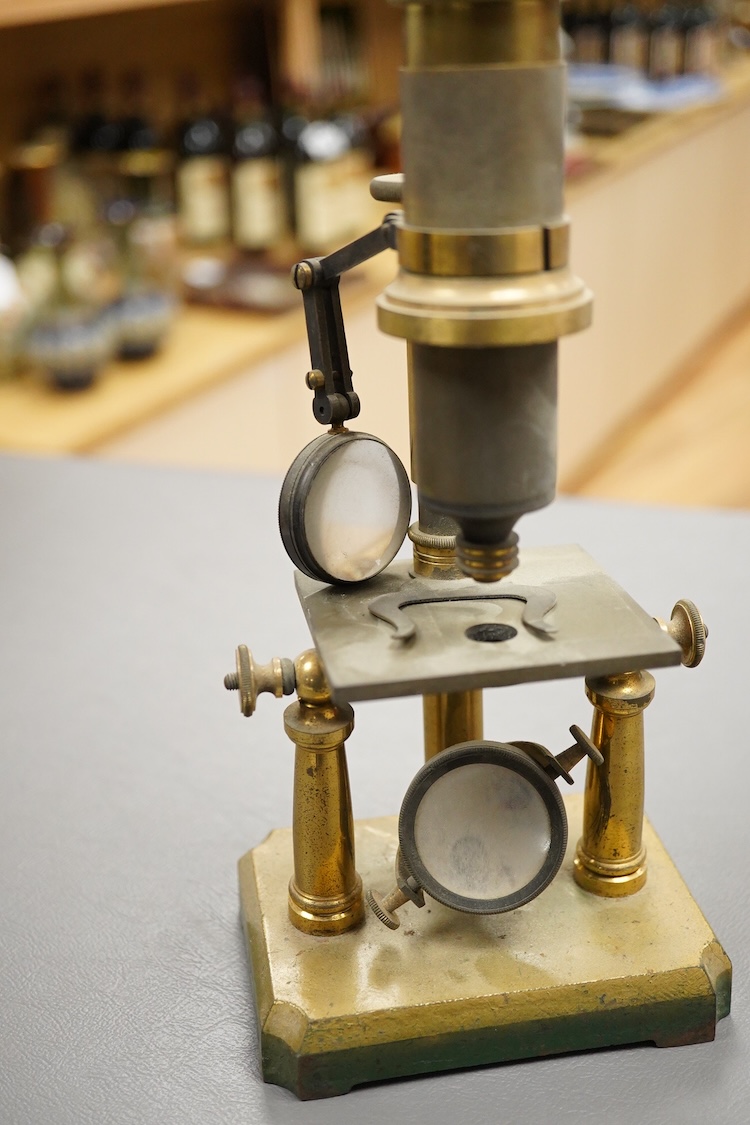 A mid 19th century French brass monocular microscope, 26cm high